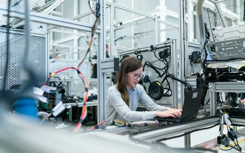 Engineer working with manufacturing systems
