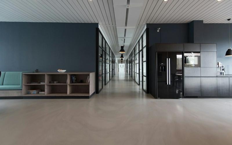 Modern office corridor with workspaces