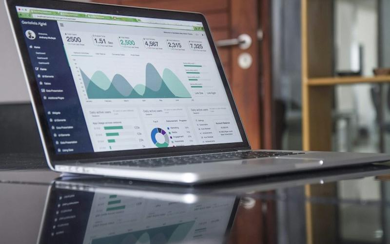Analytics on a laptop used to control IT and cloud cost
